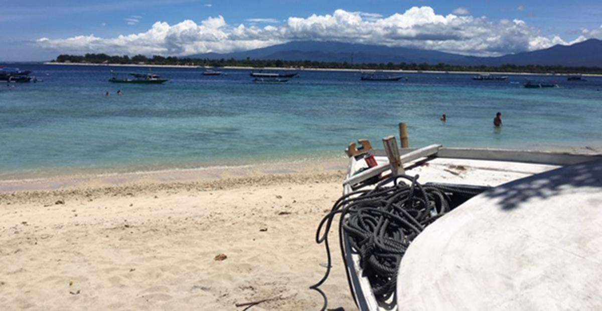 A photo of a serene beach - make sure you take time to rest!