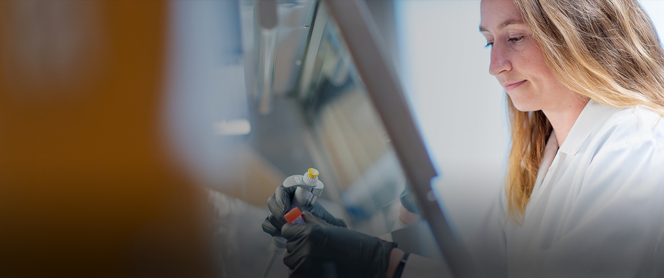 a woman scientist works in a laboratory