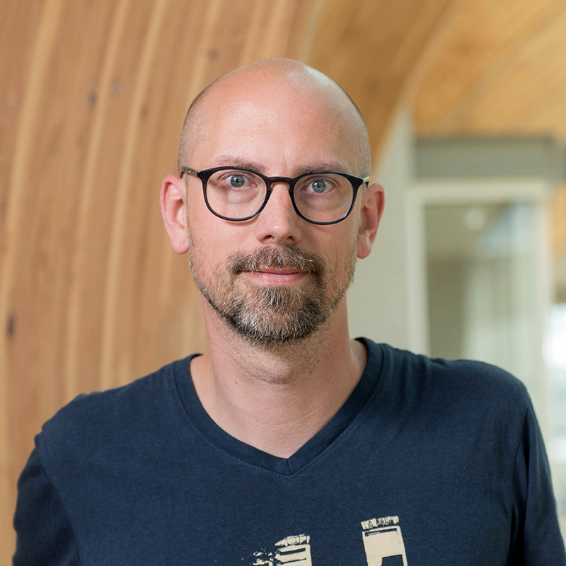 caucasian man wearing glasses