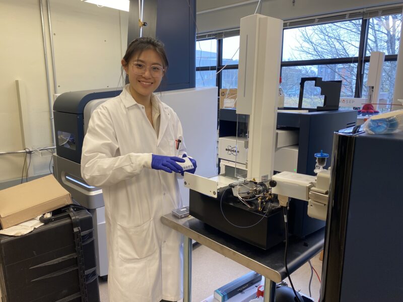 Lucy loads samples onto the SCP mass spectrometer.